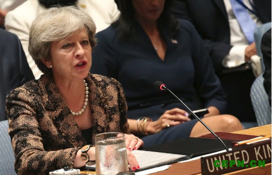 英国首相特蕾莎·梅就美国执意退出《巴黎气