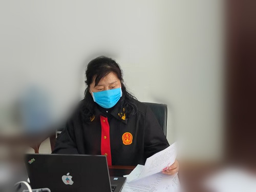 坚持疫情防控和审判工作“双主线”