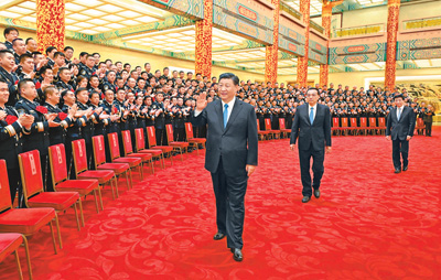 习近平会见全国公安系统英雄模范立功集体表