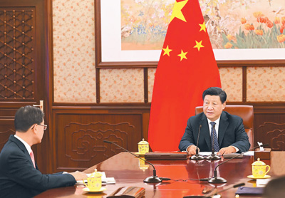 习近平会见来京述职的李家超