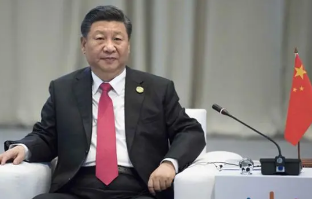 习近平同贝宁总统塔隆就中贝复交50周年互