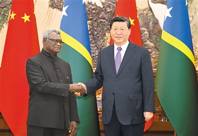 习近平会见所罗门群岛总理索加瓦雷