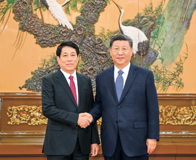 习近平会见越共中央书记处常务书记梁强